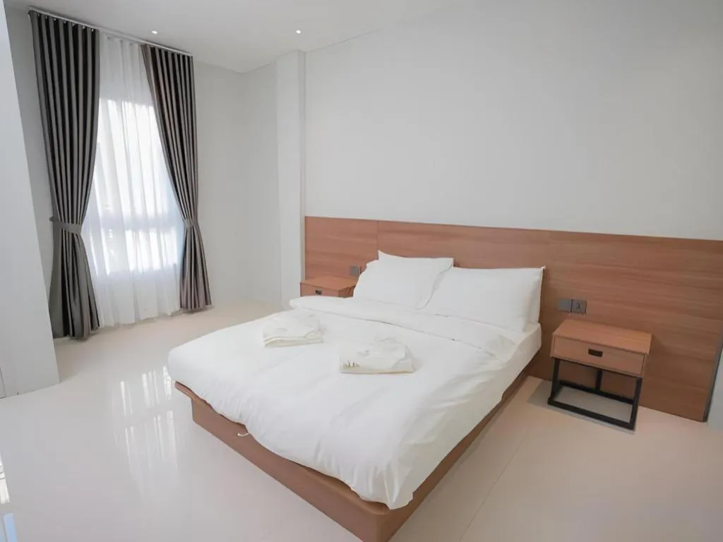 Bed in Athenee Hotel Vientiane