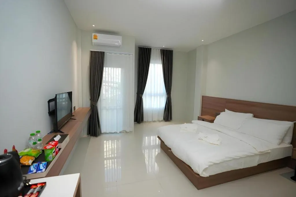 Bed in Athenee Hotel Vientiane