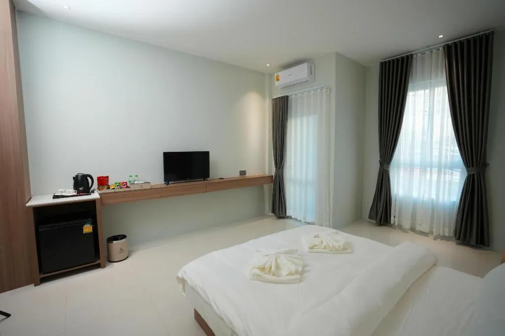 Bed in Athenee Hotel Vientiane