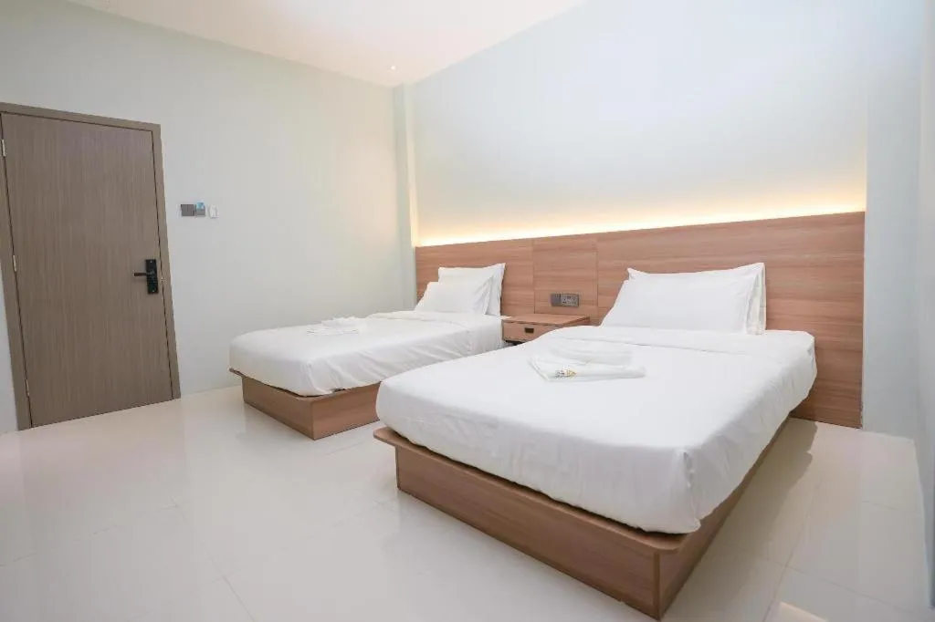 Bed in Athenee Hotel Vientiane