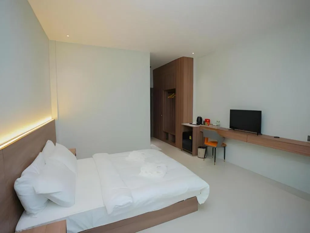 Bed in Athenee Hotel Vientiane