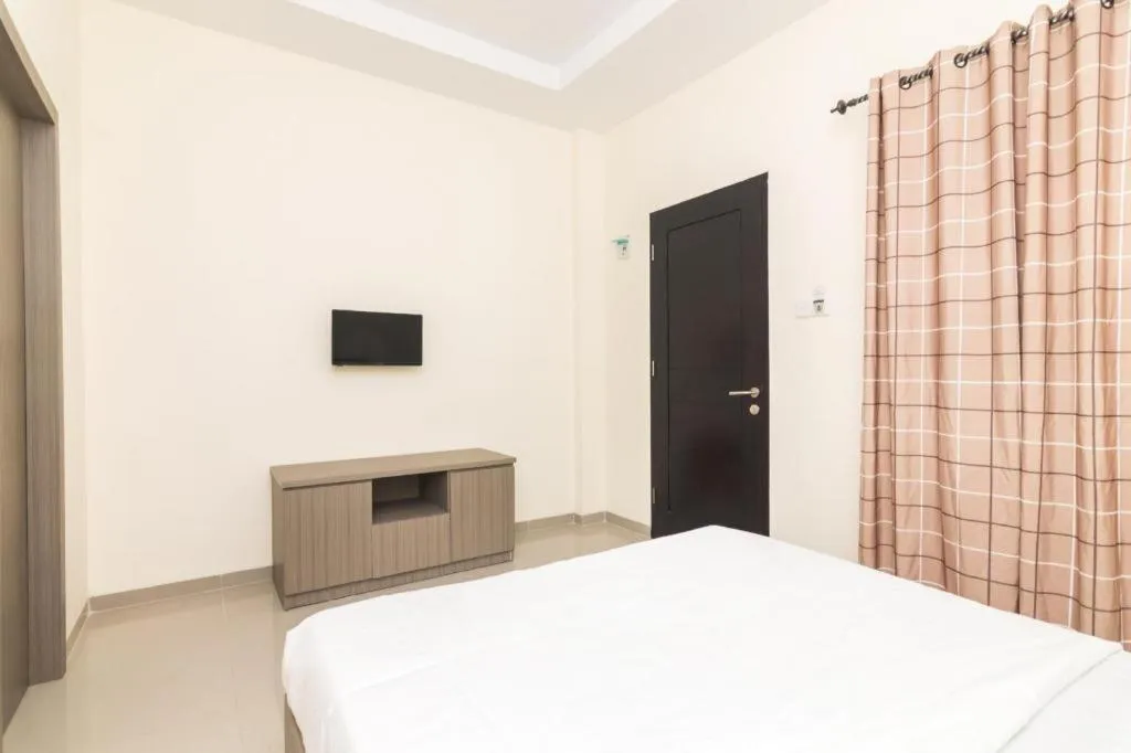 Bed in OYO Life 2735 Graha Nirwana