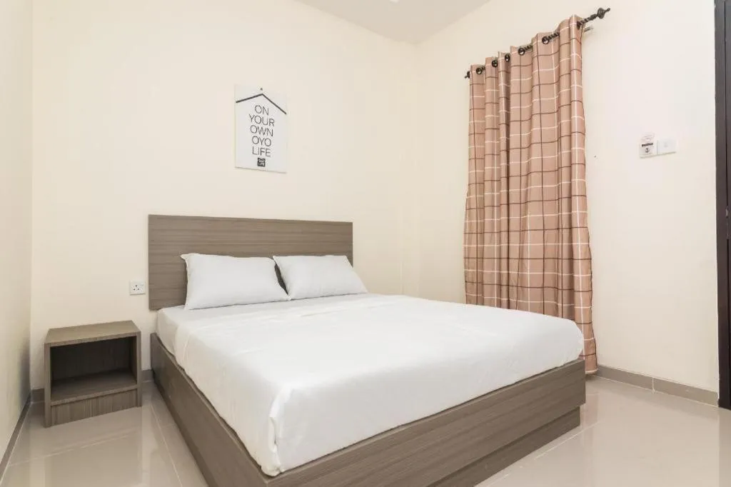 Bed in OYO Life 2735 Graha Nirwana