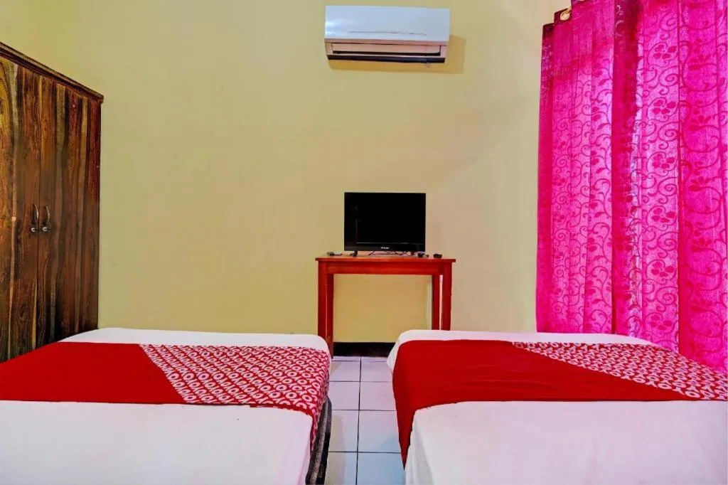 Bed in Hotel O P3 Guest House