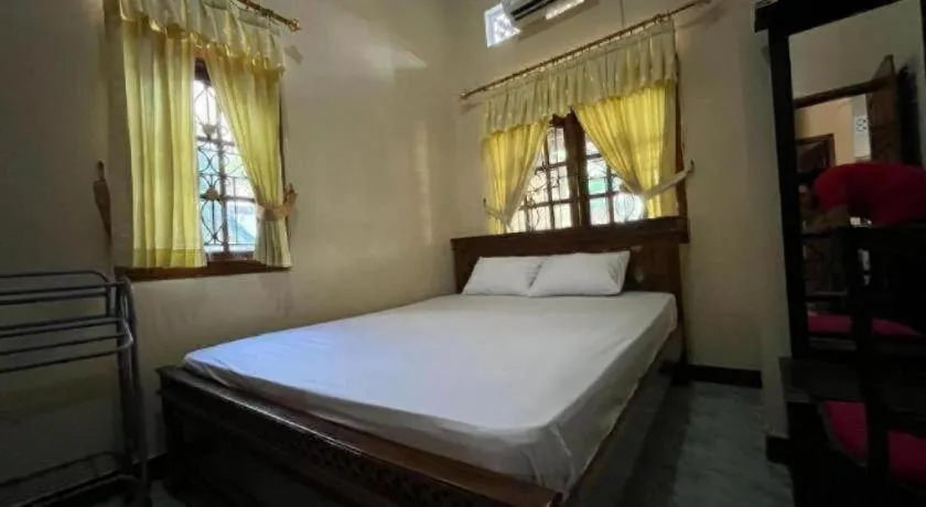 Bed in OYO 94003 Anjuk Ladang Homestay