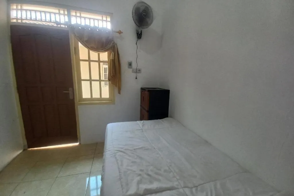 Bed in Hotel O Guest House Wijaya Syariah Near alun alun kota purwokerto