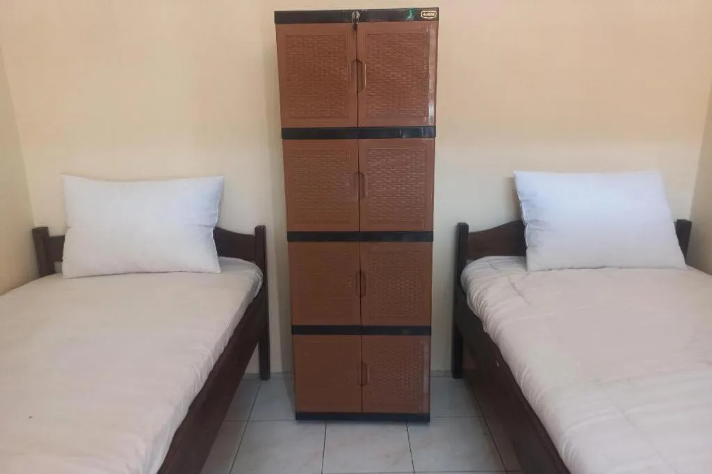 Bed in Hotel O Guest House Wijaya Syariah Near alun alun kota purwokerto