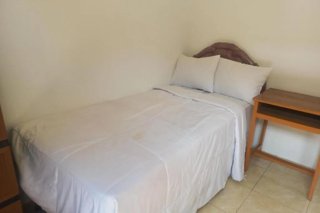 Bed in Hotel O Guest House Wijaya Syariah Near alun alun kota purwokerto