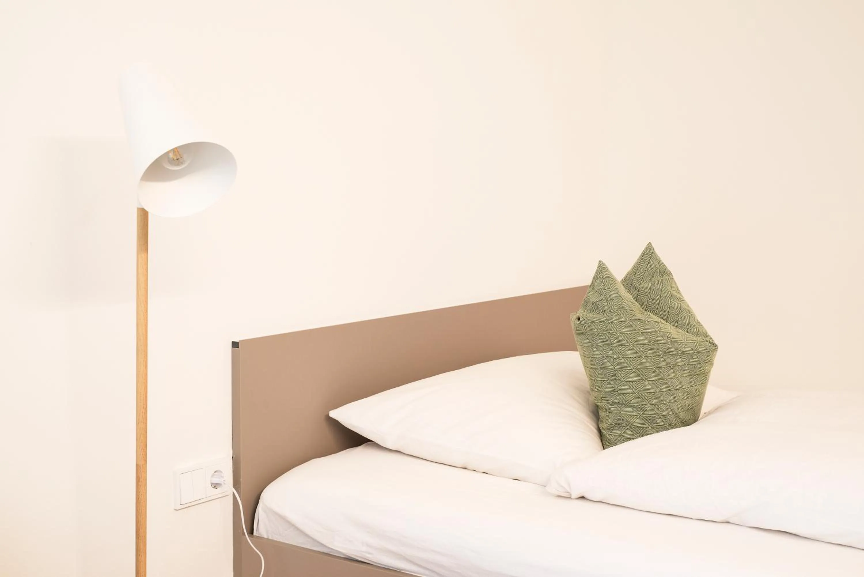 Bed in Happy Stay Rentals
