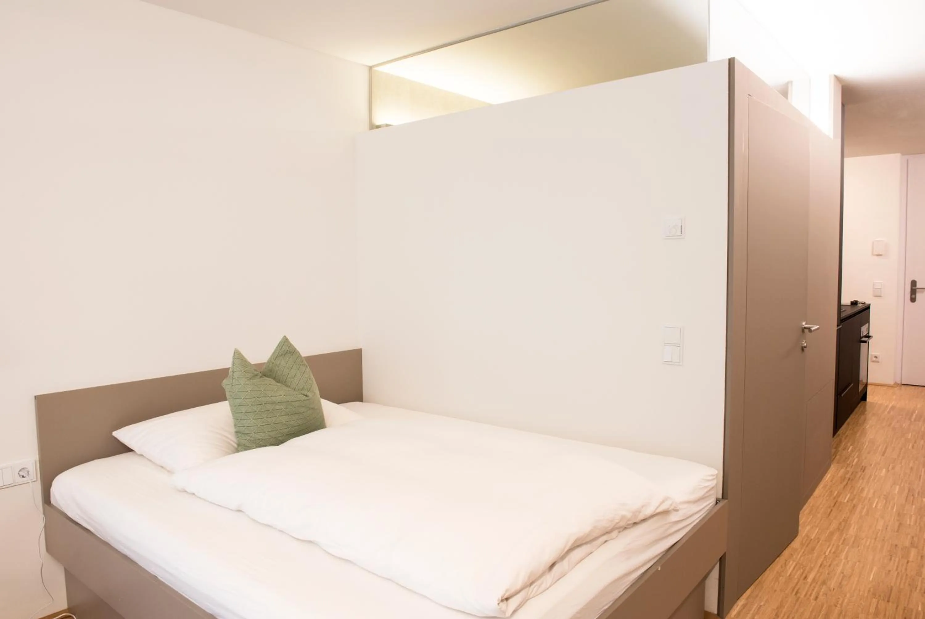 Bed in Happy Stay Rentals