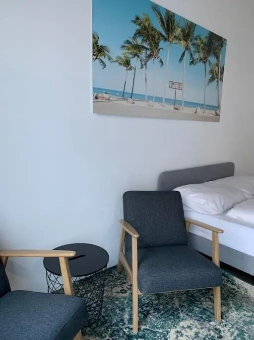 Seating area, Bed in Happy Stay Rentals