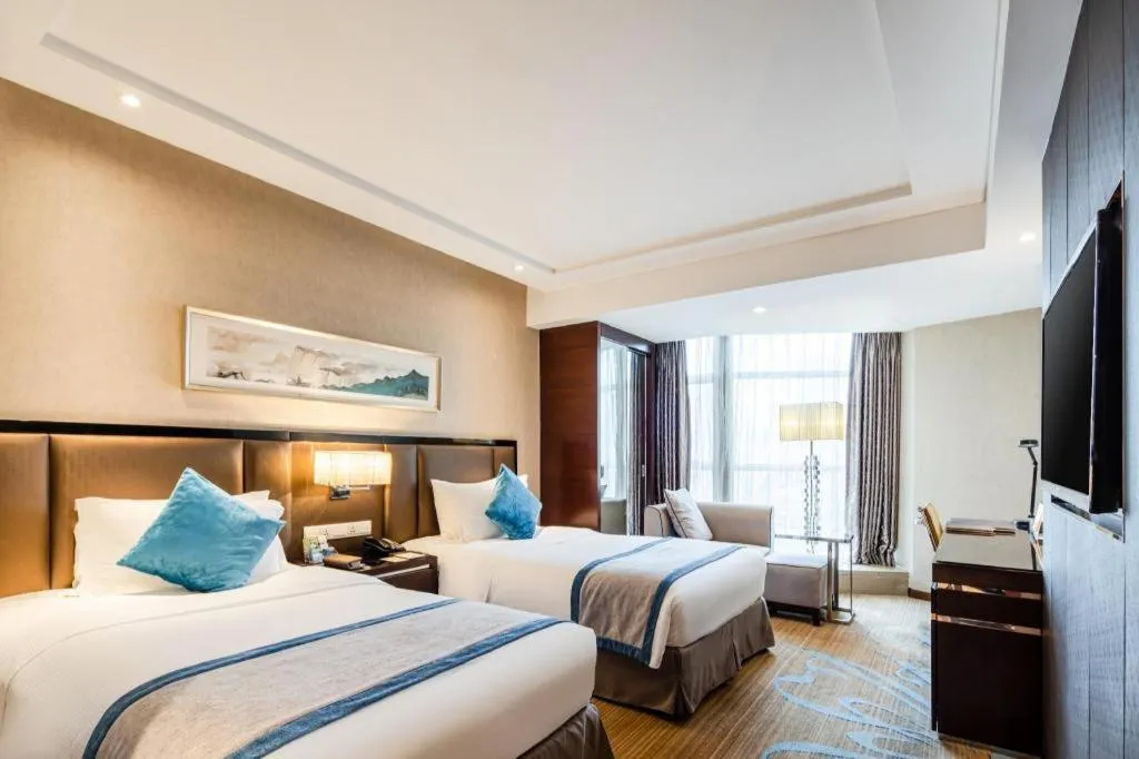 Bed in Chengdu Rising Butterfly Hotel