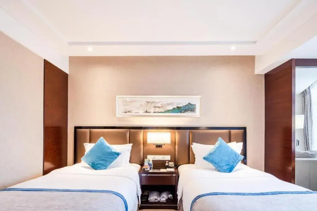 Bed in Chengdu Rising Butterfly Hotel Bed in Chengdu Rising Butterfly Hotel