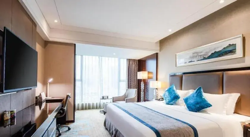 Bed in Chengdu Rising Butterfly Hotel Bed in Chengdu Rising Butterfly Hotel