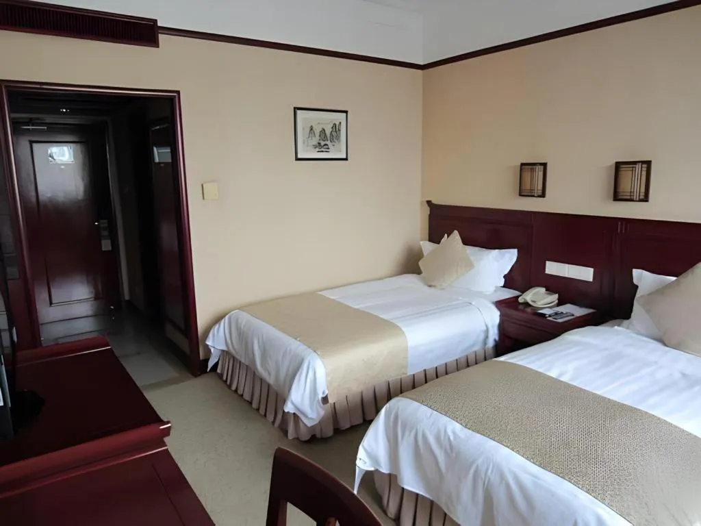 Bed in Meiyuan Hotel Hangzhou