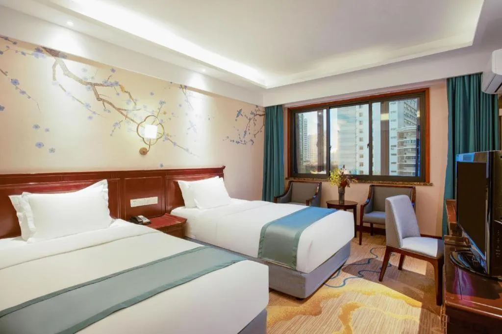 Bed in Meiyuan Hotel Hangzhou