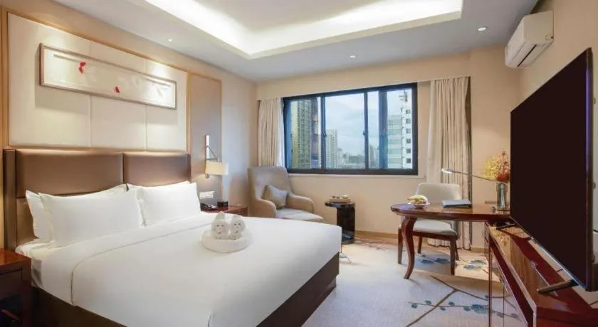 Bed in Meiyuan Hotel Hangzhou