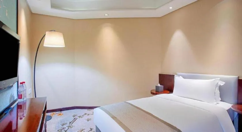 Bed in Meiyuan Hotel Hangzhou