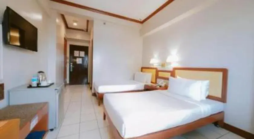 Bed in Palm Hotel Manila Bed in Palm Hotel Manila