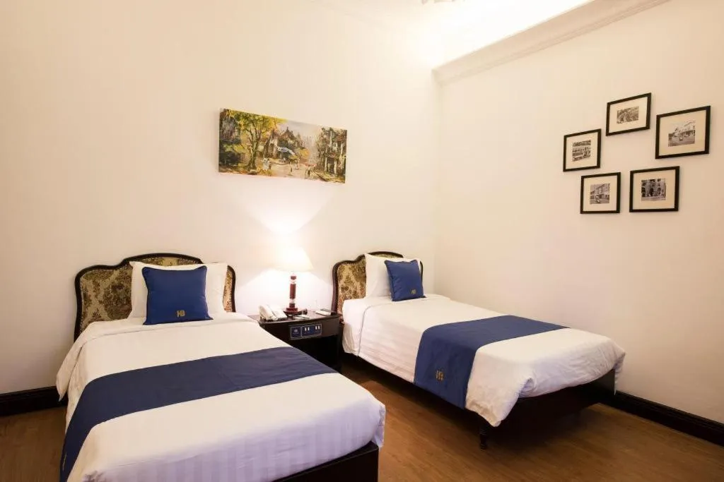 Bed in Hoa Binh Hotel