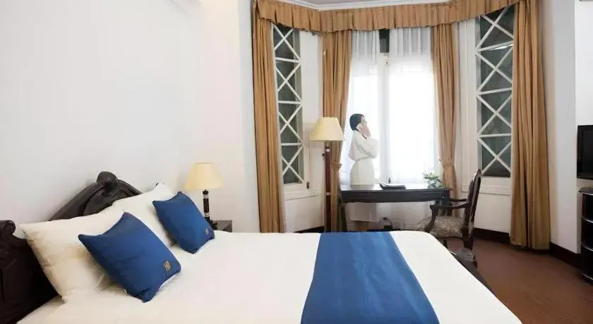 Bed in Hoa Binh Hotel Bed in Hoa Binh Hotel