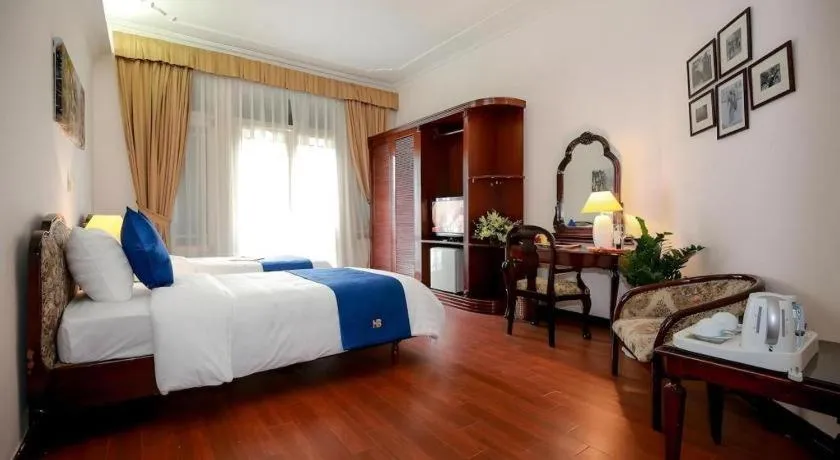 Bed in Hoa Binh Hotel