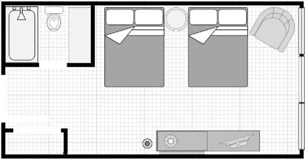 Bed in Adam's Mark Hotel & Conference Center