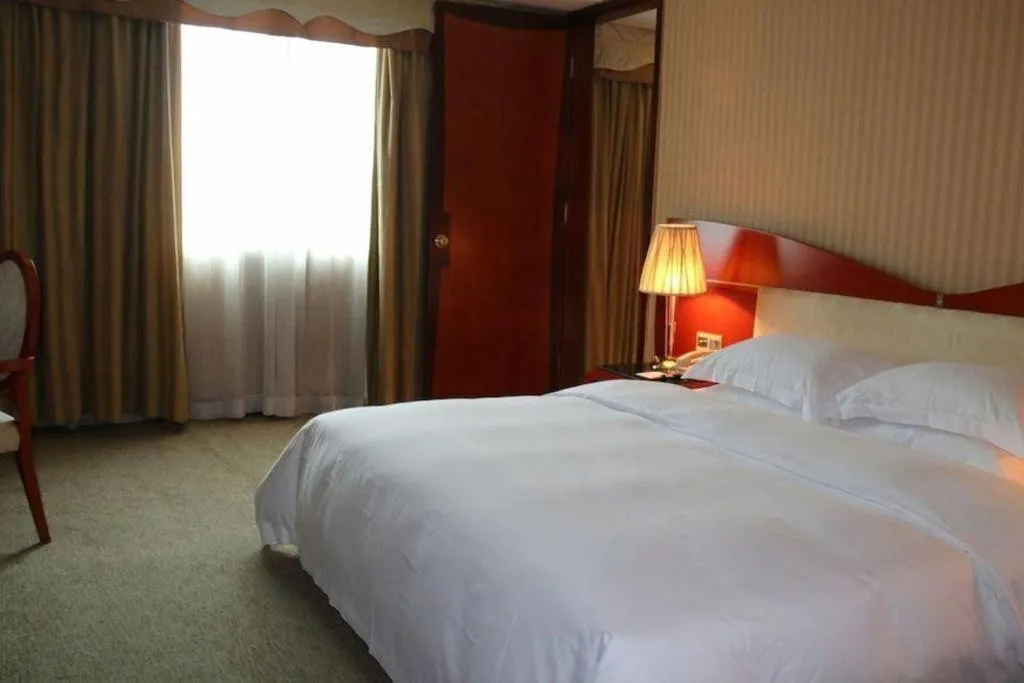 Bed in Cinese Hotel Dongguan
