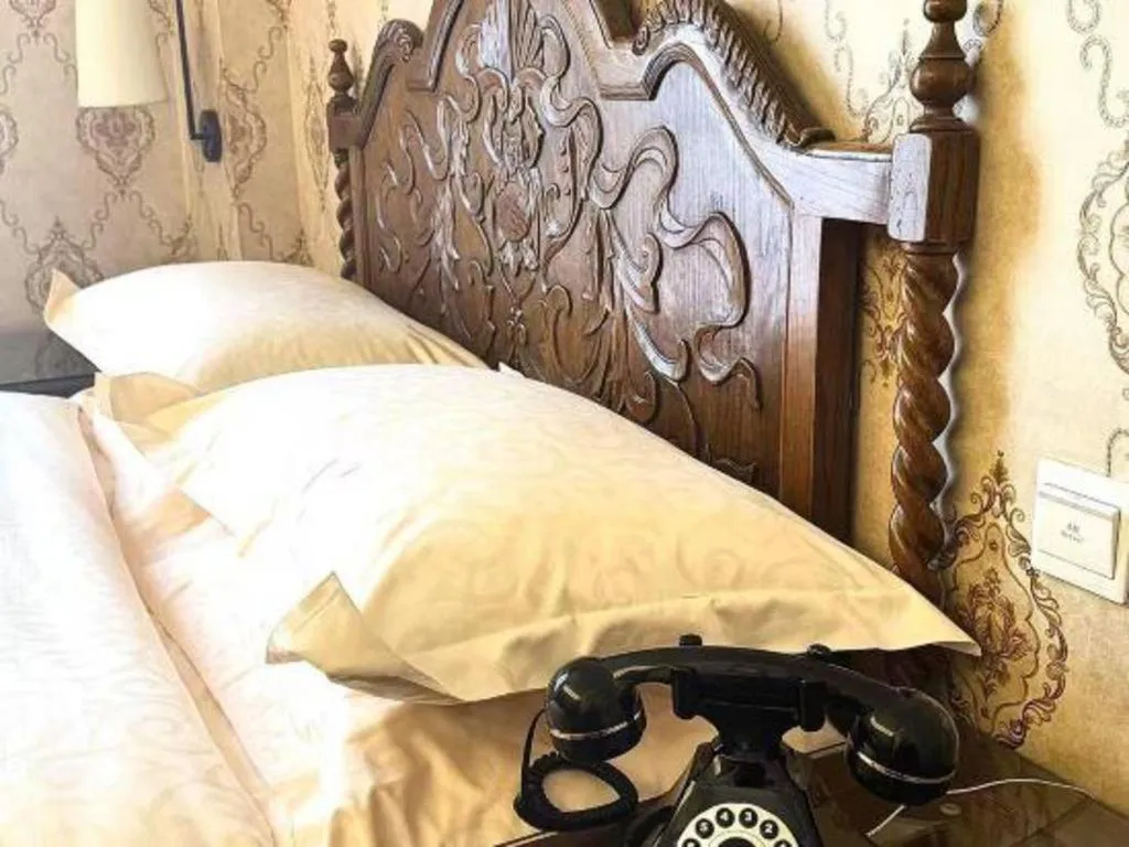 Bed in Dong Fang Hotel