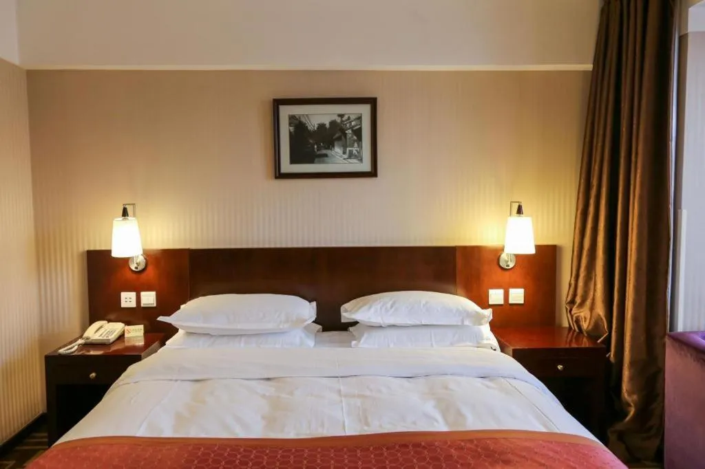Bed in Dong Fang Hotel