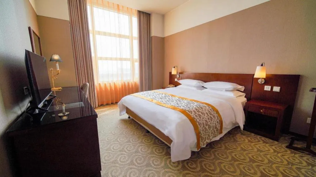 Bed in Dong Fang Hotel