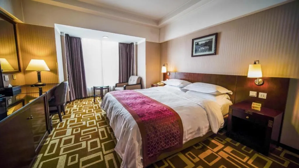 Bed in Dong Fang Hotel