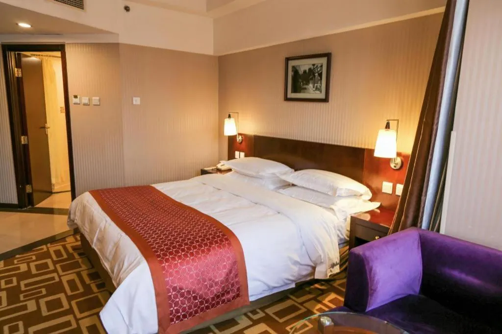 Bed in Dong Fang Hotel