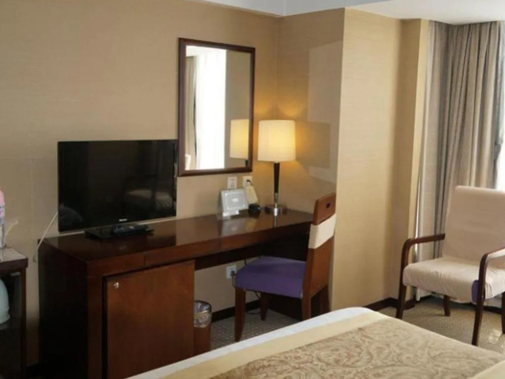 Bed in Dong Fang Hotel