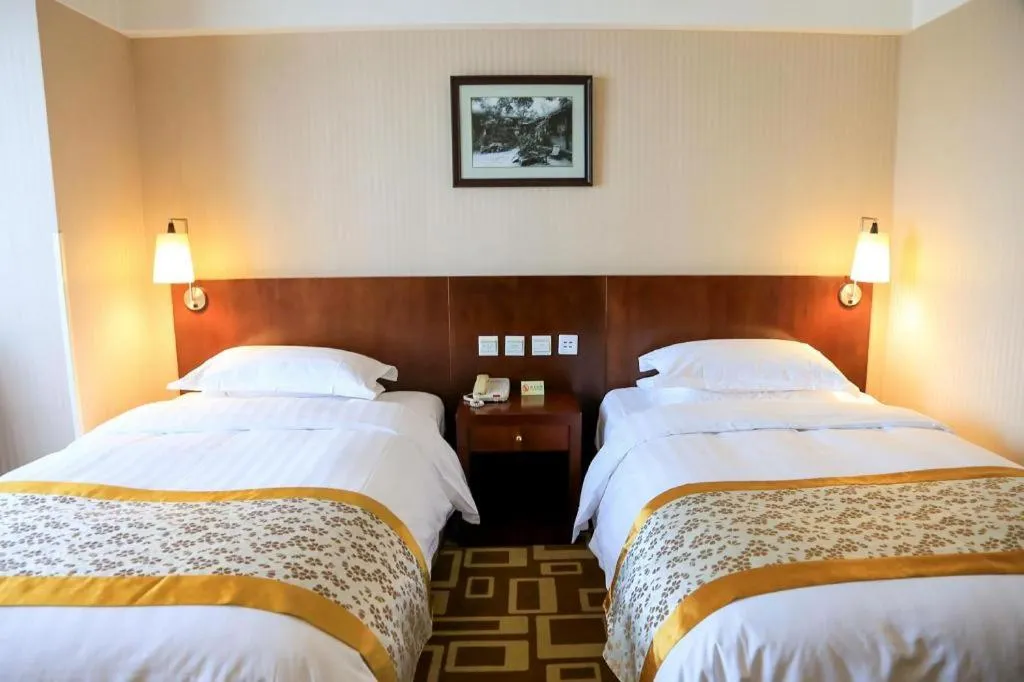 Bed in Dong Fang Hotel