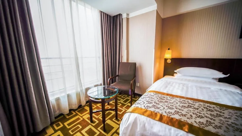 Bed in Dong Fang Hotel