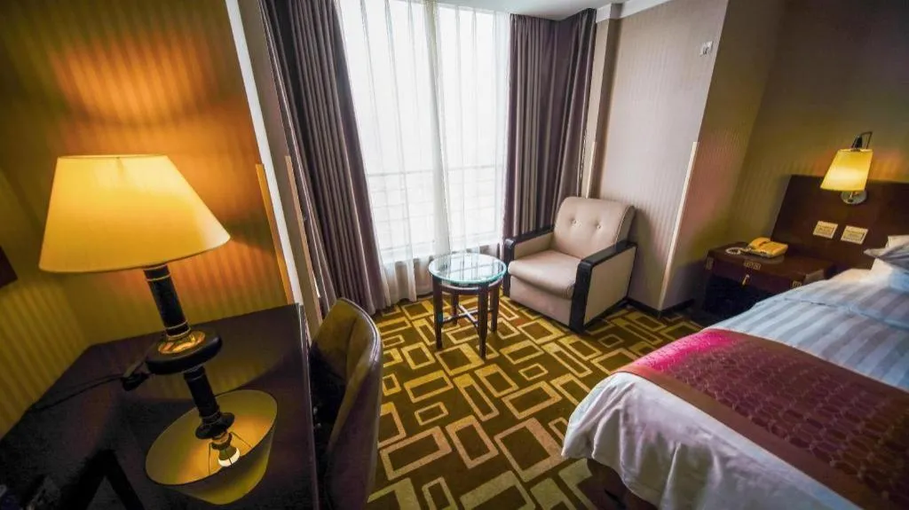 Bed in Dong Fang Hotel