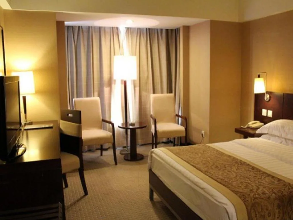 Bed in Dong Fang Hotel