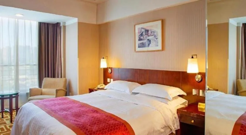 Bed in Dong Fang Hotel