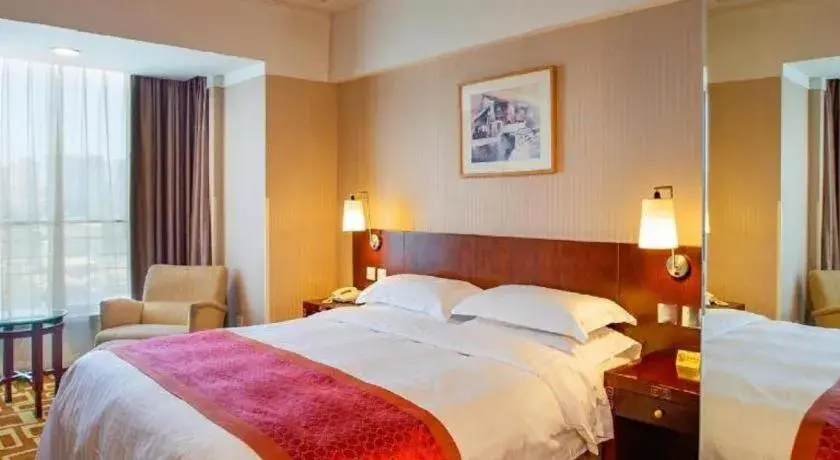 Bed in Dong Fang Hotel Bed in Dong Fang Hotel