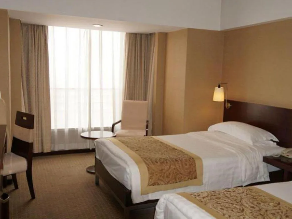 Bed in Dong Fang Hotel