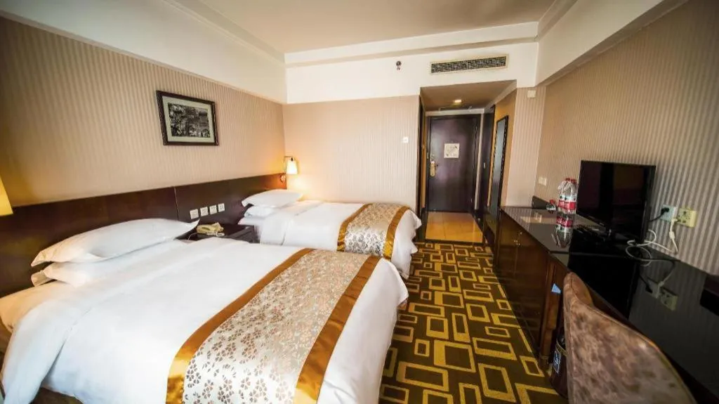 Bed in Dong Fang Hotel