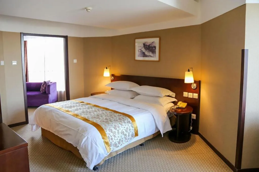 Bed in Dong Fang Hotel