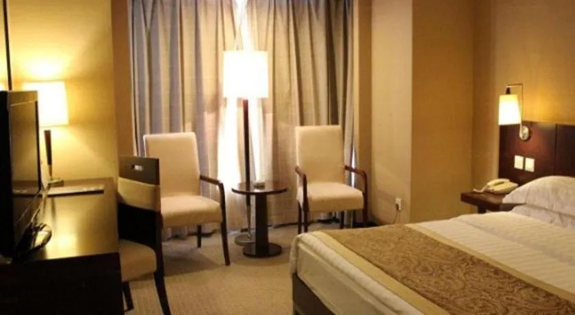 Bed in Dong Fang Hotel