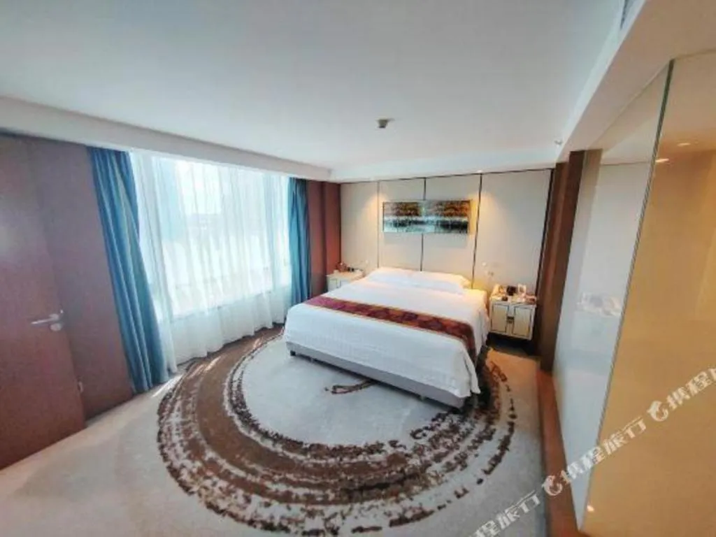 Bed in Hainan Junhua Haiyi Hotel