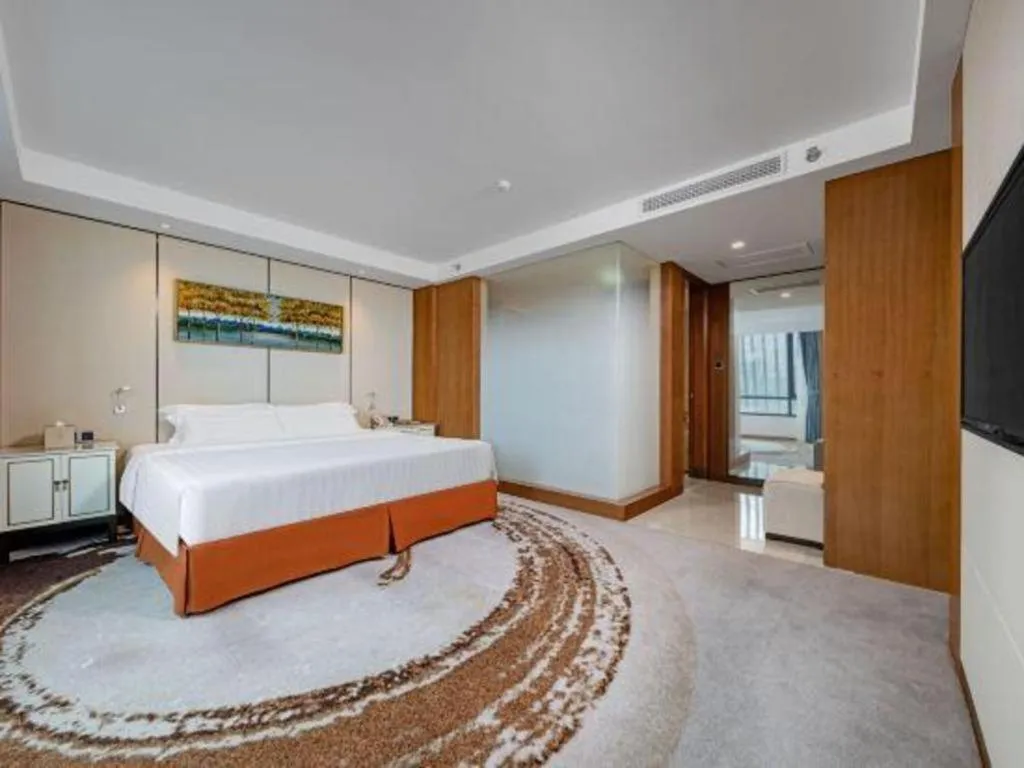 Bed in Hainan Junhua Haiyi Hotel