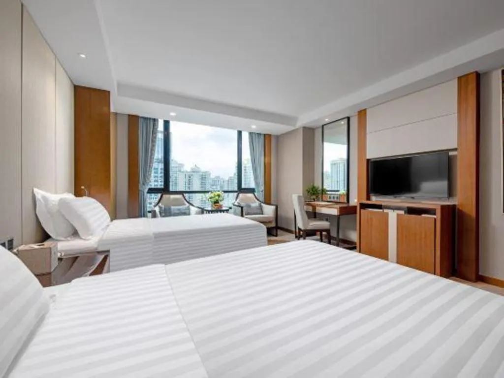 Bed in Hainan Junhua Haiyi Hotel