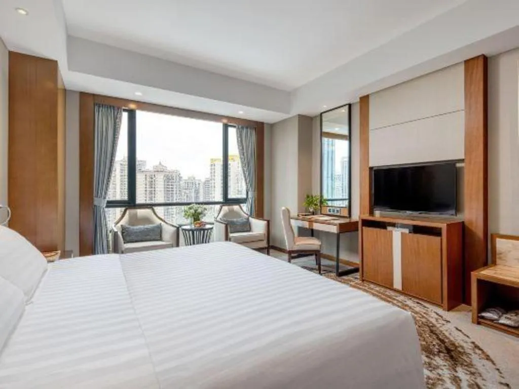 Bed in Hainan Junhua Haiyi Hotel