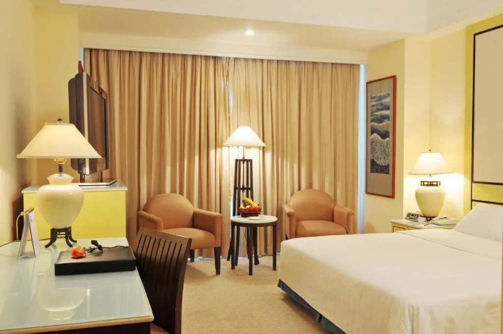 Bed in Hainan Junhua Haiyi Hotel