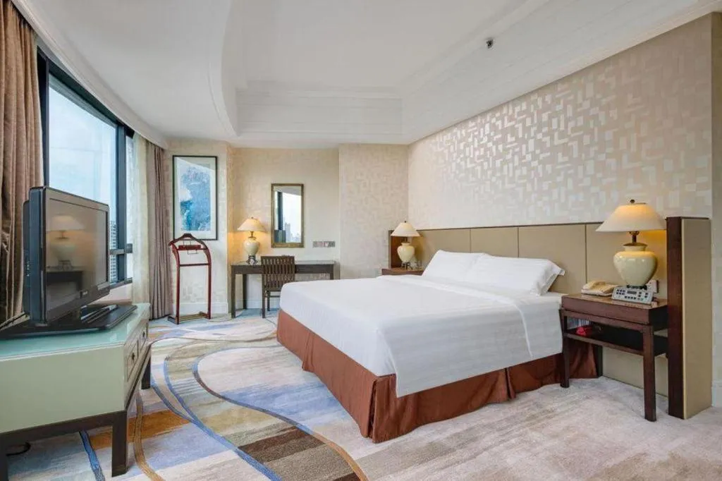 Bed in Hainan Junhua Haiyi Hotel